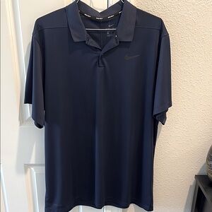 Nike Men's Navy Blue Polo Shirt gentility worn and dry cleaned